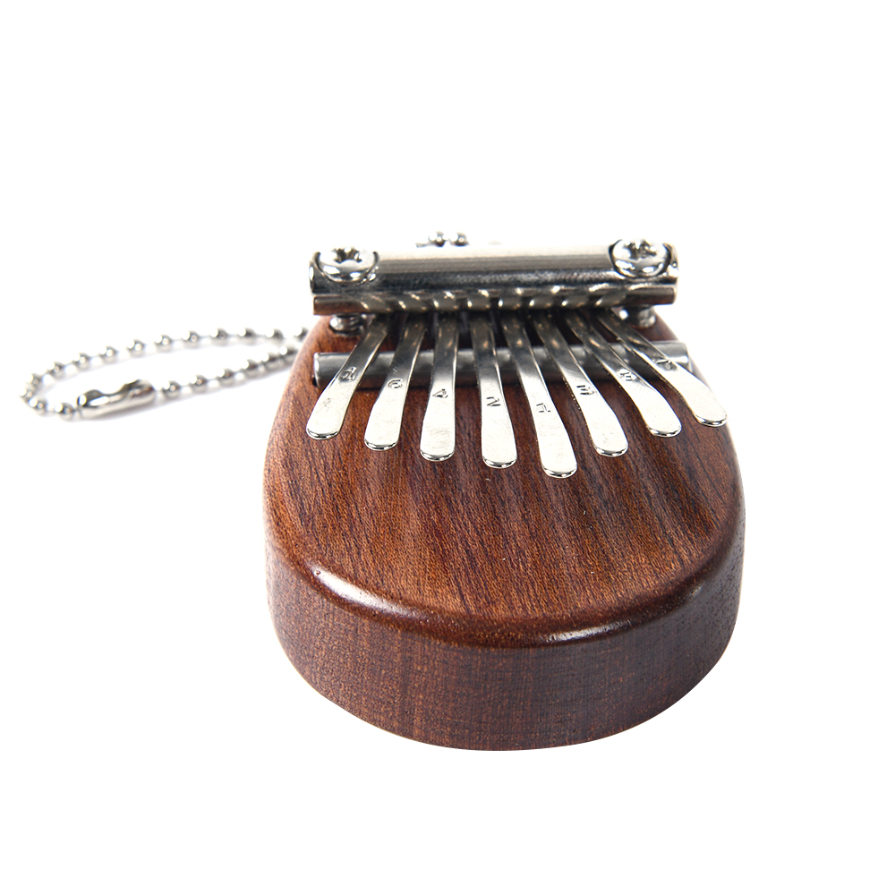 8 Key Mini Portable Thumb Pian - A Musical Instrument With Keys recension och pris
