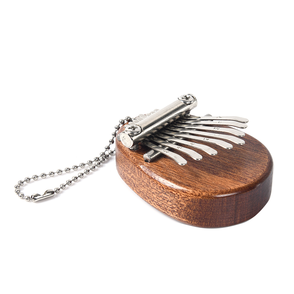 8 Key Mini Portable Thumb Pian - A Musical Instrument With Keys recension och pris
