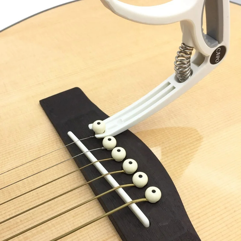 Plastic Guitar Capo for 6 Stri - Musical Instrument Gif recension och pris