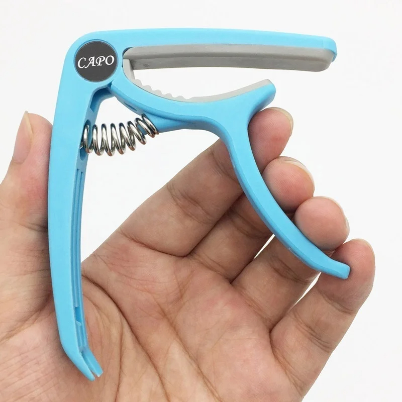 Plastic Guitar Capo for 6 Stri - Musical Instrument Gif recension och pris